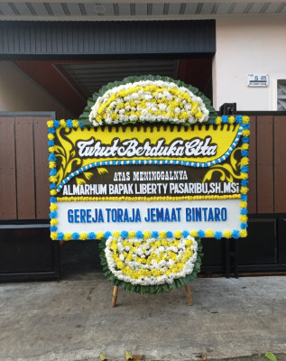 Papan Bunga Duka di Pancuran Gerobak
